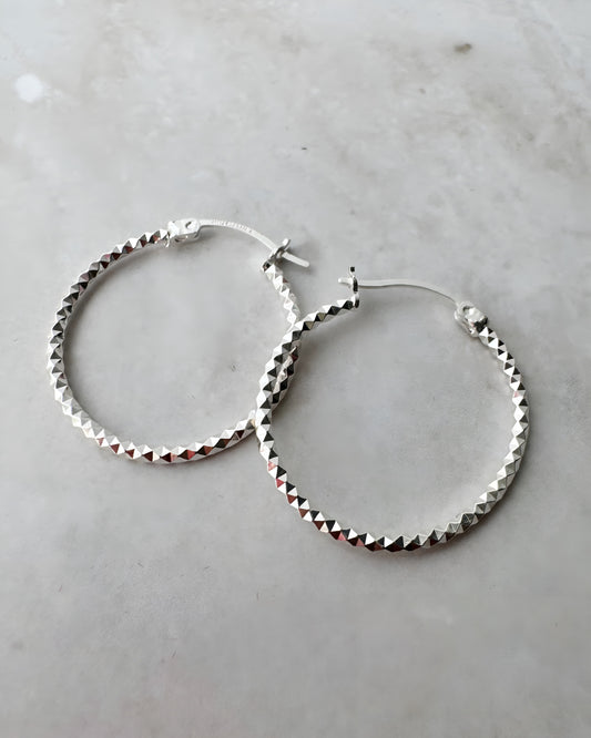 Arracada pico grande